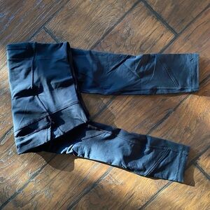 Lululemon black cropped running tights. Size 2.